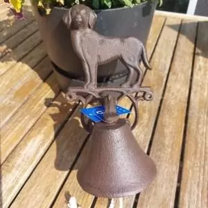 Metalen bel met hond